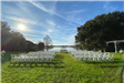 Outdoor wedding setting with lake