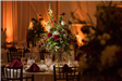 Round table with large floral arrangement