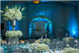 Large sofa with floral arch on stage