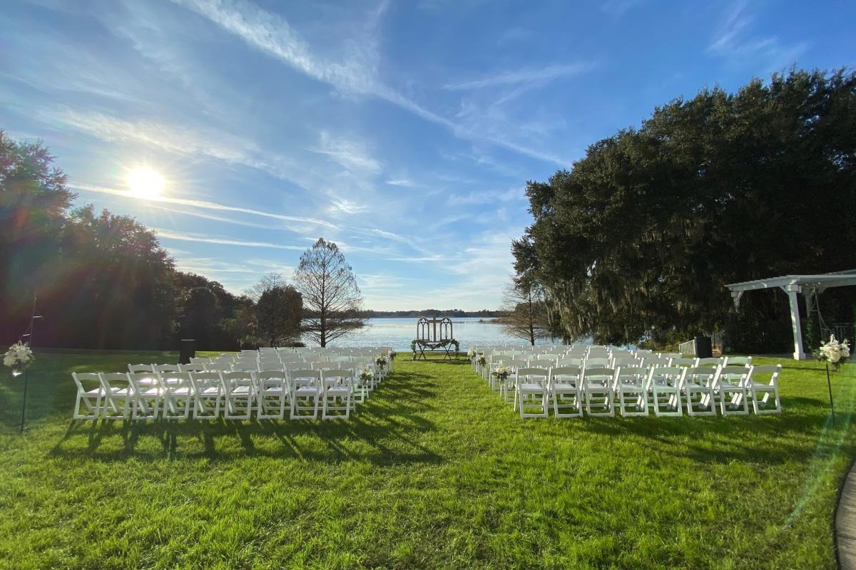 Outdoor wedding setting with lake