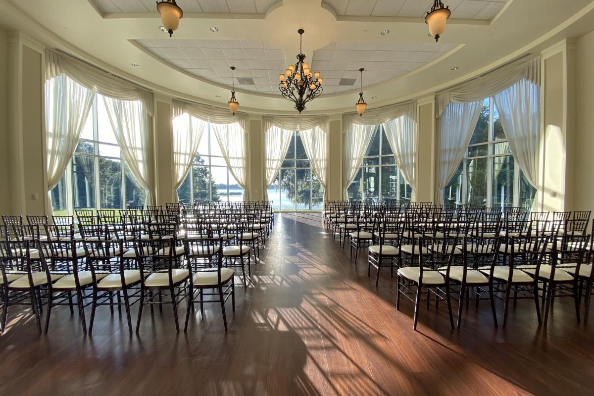 Indoor wedding set up with Chiavari chairs