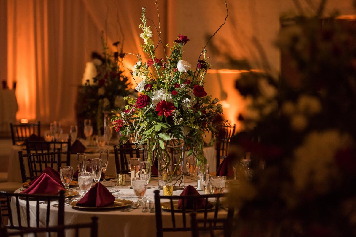 Round table with large floral arrangement