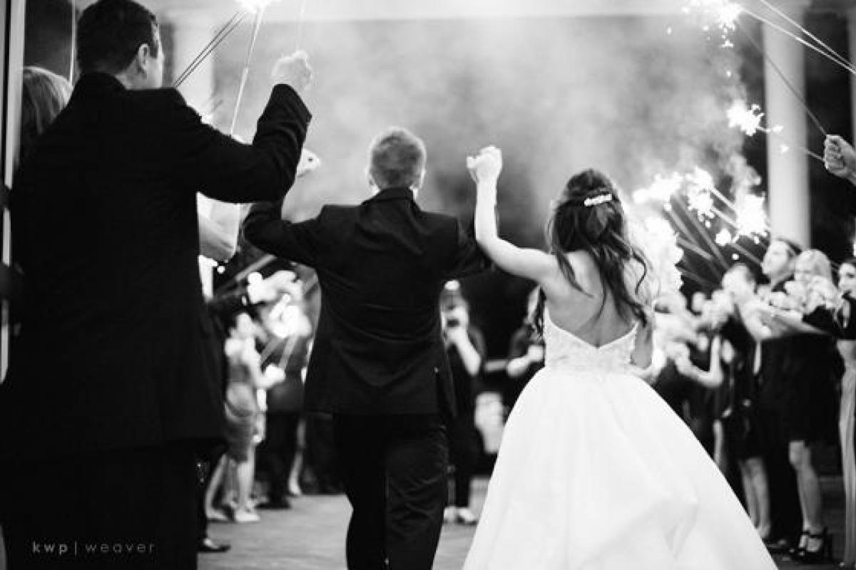 Bride and groom at sparkler exit